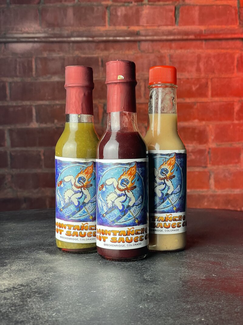 Montañero Hot Sauce Collection - Red, Banana Habanero, Blueberry, and Verde bottles